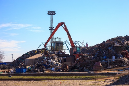 Mechanical crane grabber working in a scrapyard のeditorial素材