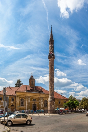 People visitors Minaret built by the Turkish invaders at the turn of the XVI - XVII Century, on August 18, 2012 in Eger, Hungary. Single slender tower rises to a height of  40m.のeditorial素材