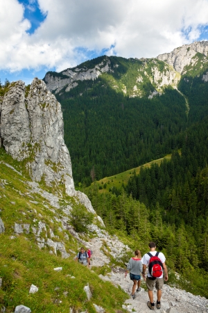Hikers on mountain trail on August 16, 2012 in the Tatra National Park, Poland.のeditorial素材