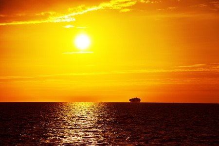 Container ship on sunrise in the sea の写真素材