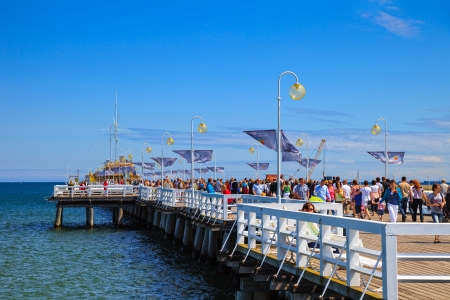 The many tourists on the largest European wooden pier in Sopot, Poland のeditorial素材