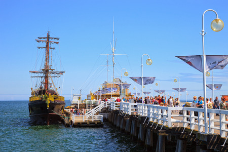 The many tourists on the largest European wooden pier in Sopot, Poland  のeditorial素材