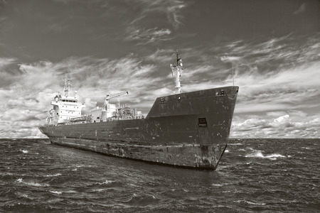 Photo of a tanker ship on sea in black and white tone 