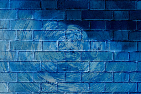 Colorful abstract graffiti on a brick wall with rings.の写真素材