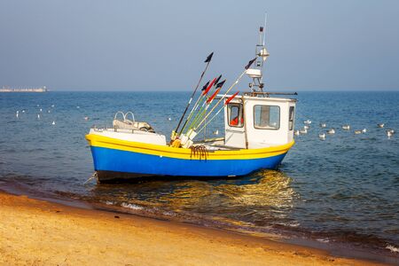 Fishing boat on the beach in Sopot, Poland.