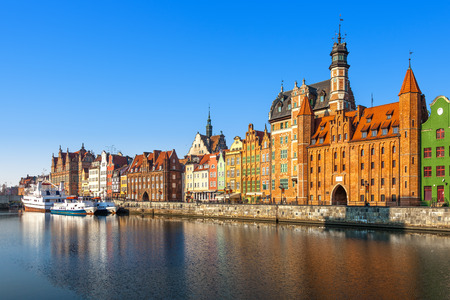 View of the riverside on Old Town by the Motlawa river in early morning light. Gdansk, Poland.