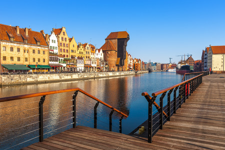 View of the riverside on Old Town by the Motlawa river in early morning light. Gdansk, Poland.