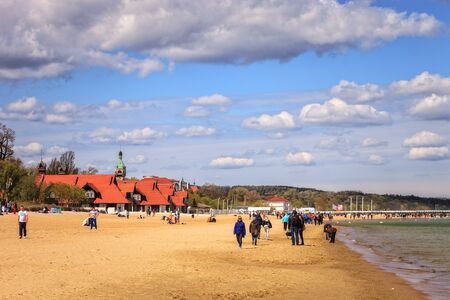 Baltic coast beach scene of many people walk, relaxing and enjoying, on May 02, 2015 in Sopot, Poland.のeditorial素材