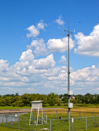 Meteorological station on the background river of Wieprz.の写真素材