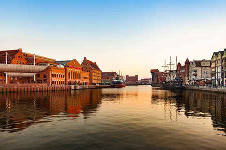 View of the riverside Old Town by the Motlawa river in sunset, on March 18, 2015 in Gdansk, Poland.のeditorial素材
