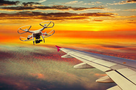 The small drone and plane on a collision course.