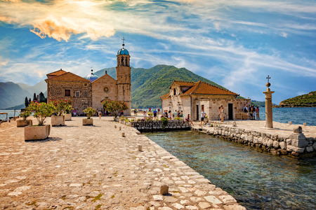 Tourists in famous Church of Our Lady of the Rocks on July 19, 2014 in Kotor, Montenegro.のeditorial素材