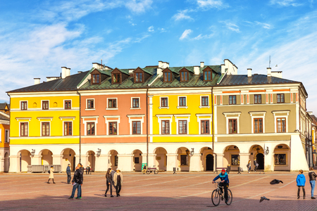 People visitors Main Market square in the old town, on April 02, 2016 in Zamosc, Poland.のeditorial素材