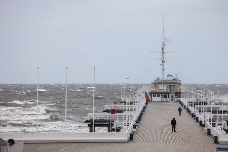 Big waves destroy the wooden pier in Sopot, Poland.のeditorial素材