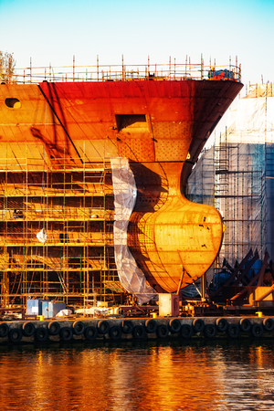 Hull of ship under construction at shipyard.の写真素材