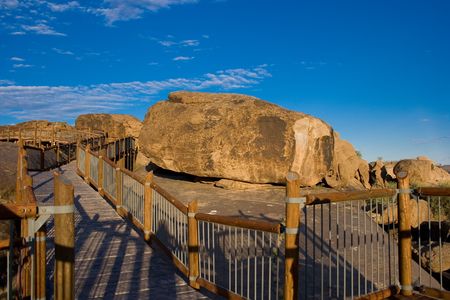 Walkways between boulders on observation deck over Augrabies Falls in south africaの写真素材