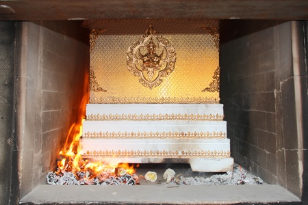 the corpse in the coffin is burning in the cremateの写真素材