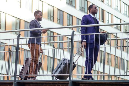 two african american business partners go towards the airport for a business meeting international Conferenceの写真素材