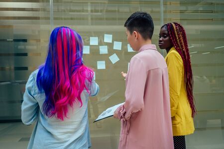 beauty woman creativity colored hair stylist wearing oversized jacket and ripped jeans