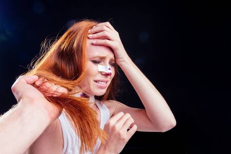 young redhead ginger woman after violence sexual rape robber criminal concept