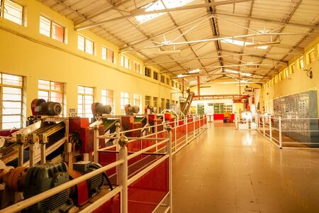 Dried tea leaves. Production line inside tea factory in India Munnar .