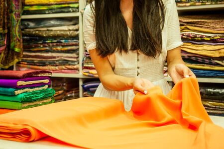 business lady shop owner cashmere yak wool shawls.female seller in goa indiaの写真素材