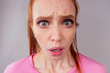 redhair ginger woman feeling unhappy love or beak up with boyfriend conceptの写真素材
