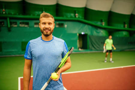 Professional tennis traner player playing a game