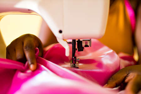 african american woman tailor creates a collection of outfitsの写真素材