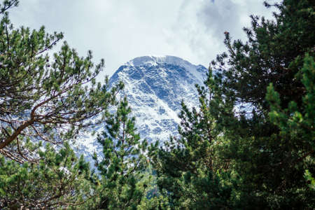big Elbrus mountain in summe on cloudy day