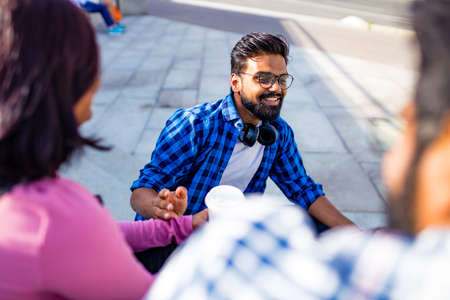 indian ethnicity friendship togetherness in park on sunny dayの写真素材