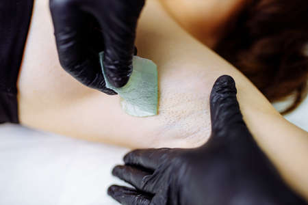 medical hot wax epilation in spa salon