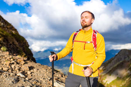 Man on top of mountain.