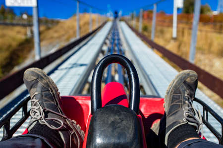Fast ride rodelbahn in autumn beautiful landscapes in Russia Sochi Krasnaya Polyanaの写真素材