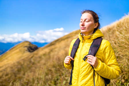 happy people are joy at peak in summer day in Russia Sochi Krasnaya Polyanaの写真素材
