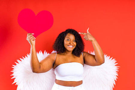 american woman matchmaker in red background valentine dayの写真素材