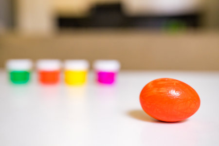 colorful handmade easter eggs on the tableの写真素材