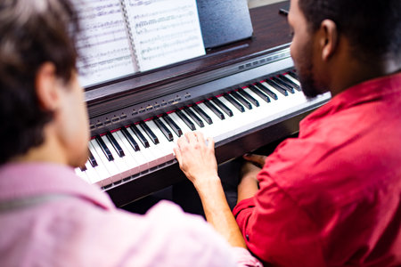 african american student having class with arabian teacher indoors