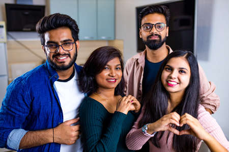 Multiracial best friends millennials at home kitchenの写真素材
