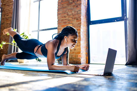 beautiful coach online blogger stream from her house against the background of panoramic windows