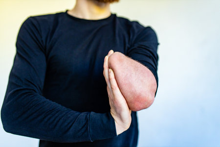 handsome man warm up and stay strong at home workoutの写真素材