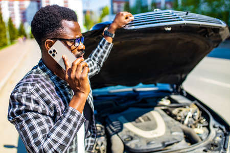 afro american calling for assistance to car service
