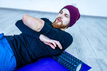 healthy lifestyle concept - man making exercises at home