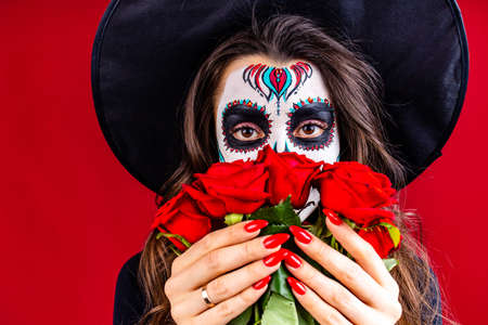 1st and 2nd november celebration of day of the dead in mexico concept woman with grimm skull face...