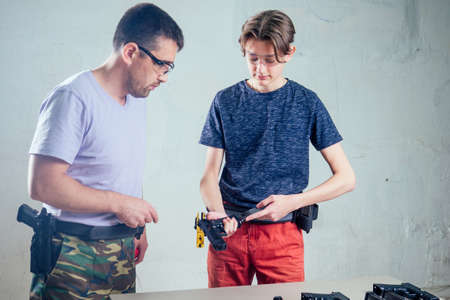 A person target practicing with a handgun for self defenseの写真素材