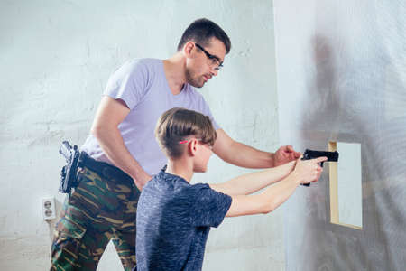 A person target practicing with a handgun for self defenseの写真素材