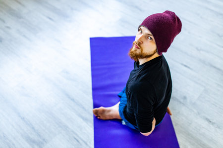 handsome man warm up and stay strong at home workout
