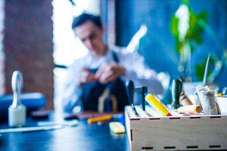 creating process of the leather things in the handmade workshopの写真素材