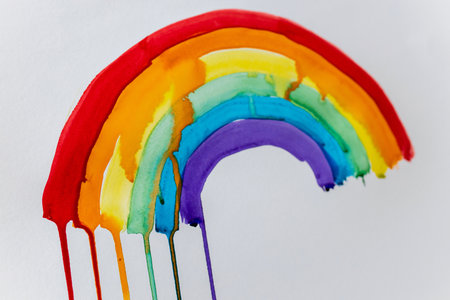 Rainbow multicolor watercolor painted on white backgroundの写真素材