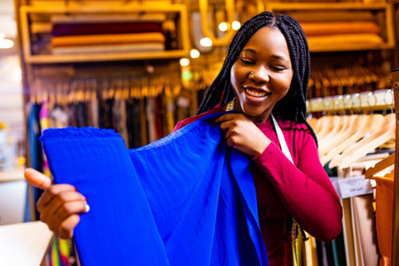 authentic ethnic africa america sellerwoman working in shopの写真素材